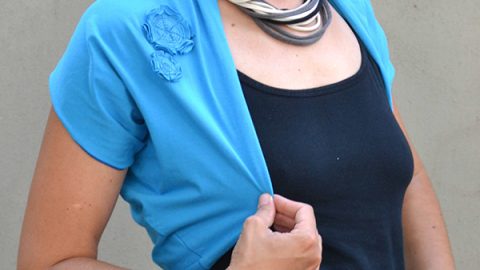 The Perfect Shrug free pattern, adorned with easy fabric flowers