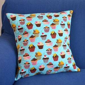 Tutorial: How to sew an envelope pillow cover. This project practices hemming, covered in the Learn to Machine Sew series for beginners on www.cucicucicoo.com.